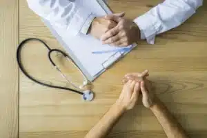 crop hands male patient doctor table 23 2147896793
