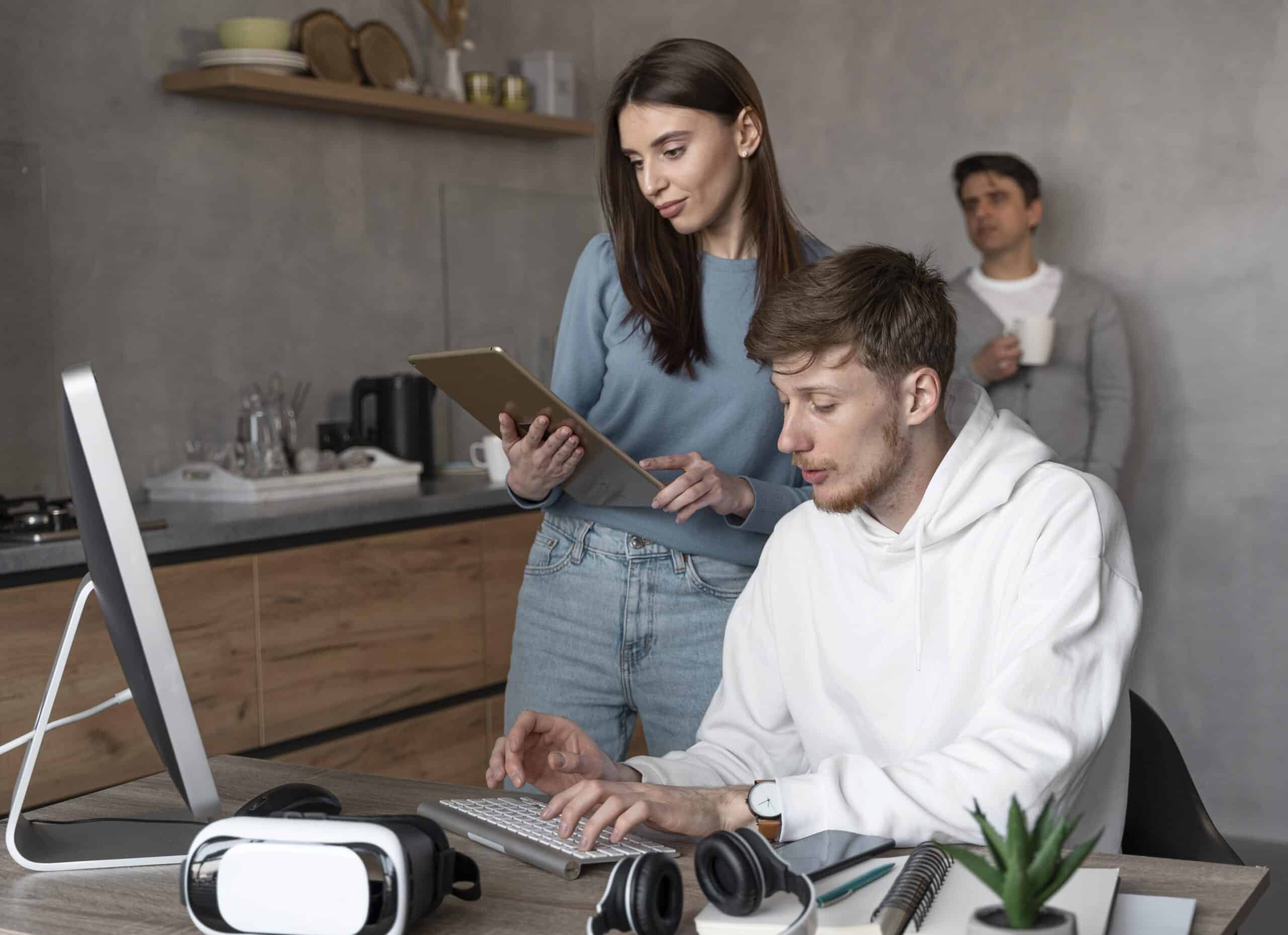 people working media field with tablet computer
